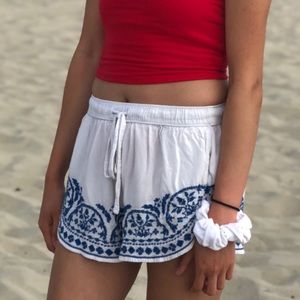 white and blue shorts